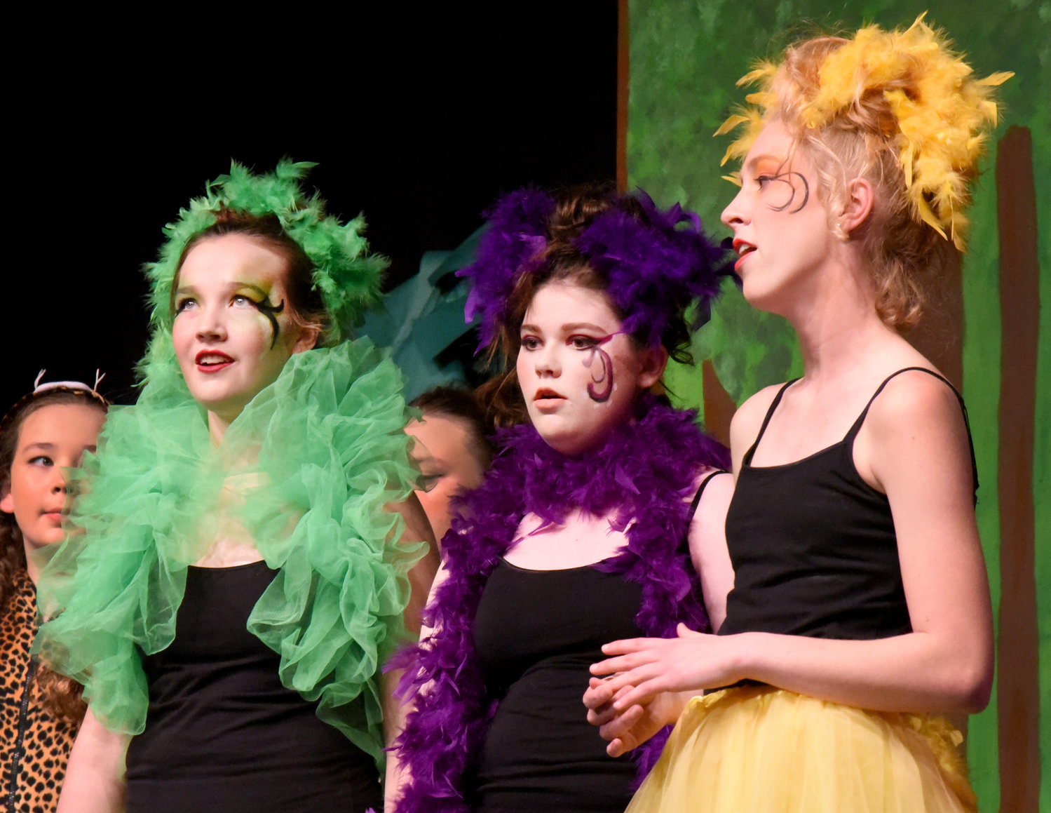 The Bird Girls (from left) Sara Branson, Savannah Platts and Natalie Patterson sing during the Lone Tree High School production of Seussical.
