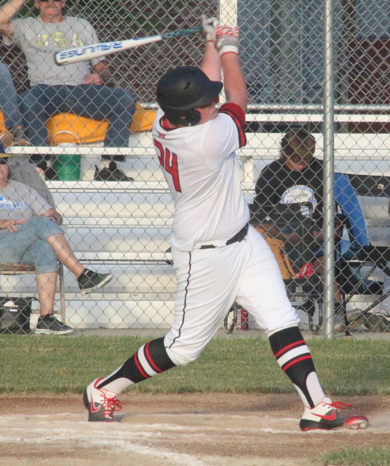 Highland’s Chase Schultz takes a big swing on June 25.