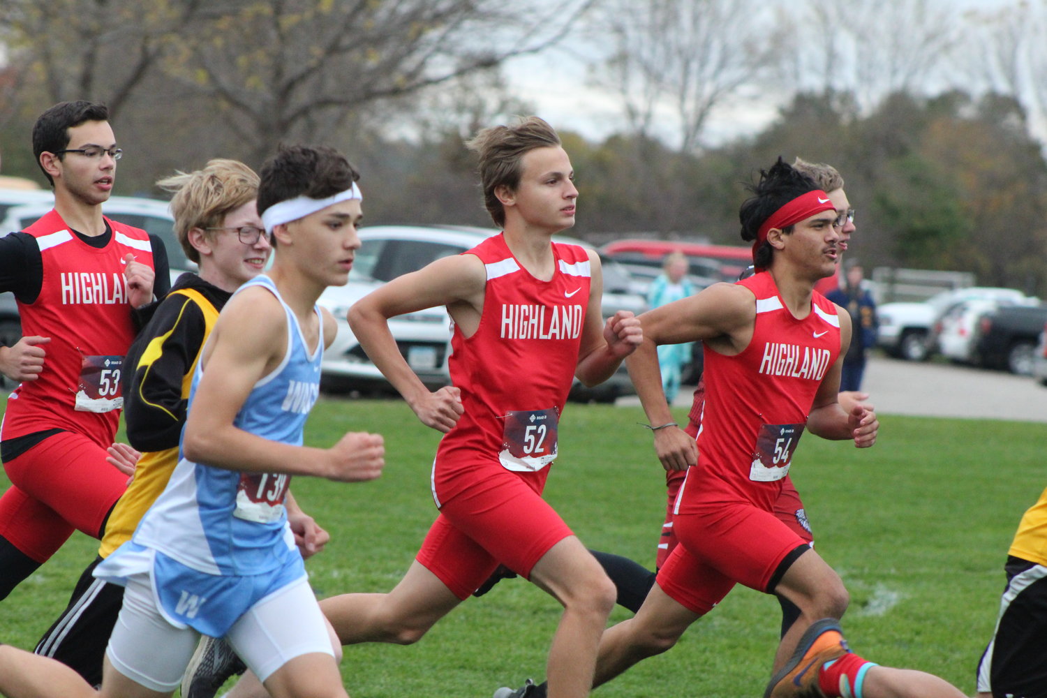 Highland runners take off at the start of the Class 1A cross country boys state qualifier on October 21 in Iowa City.