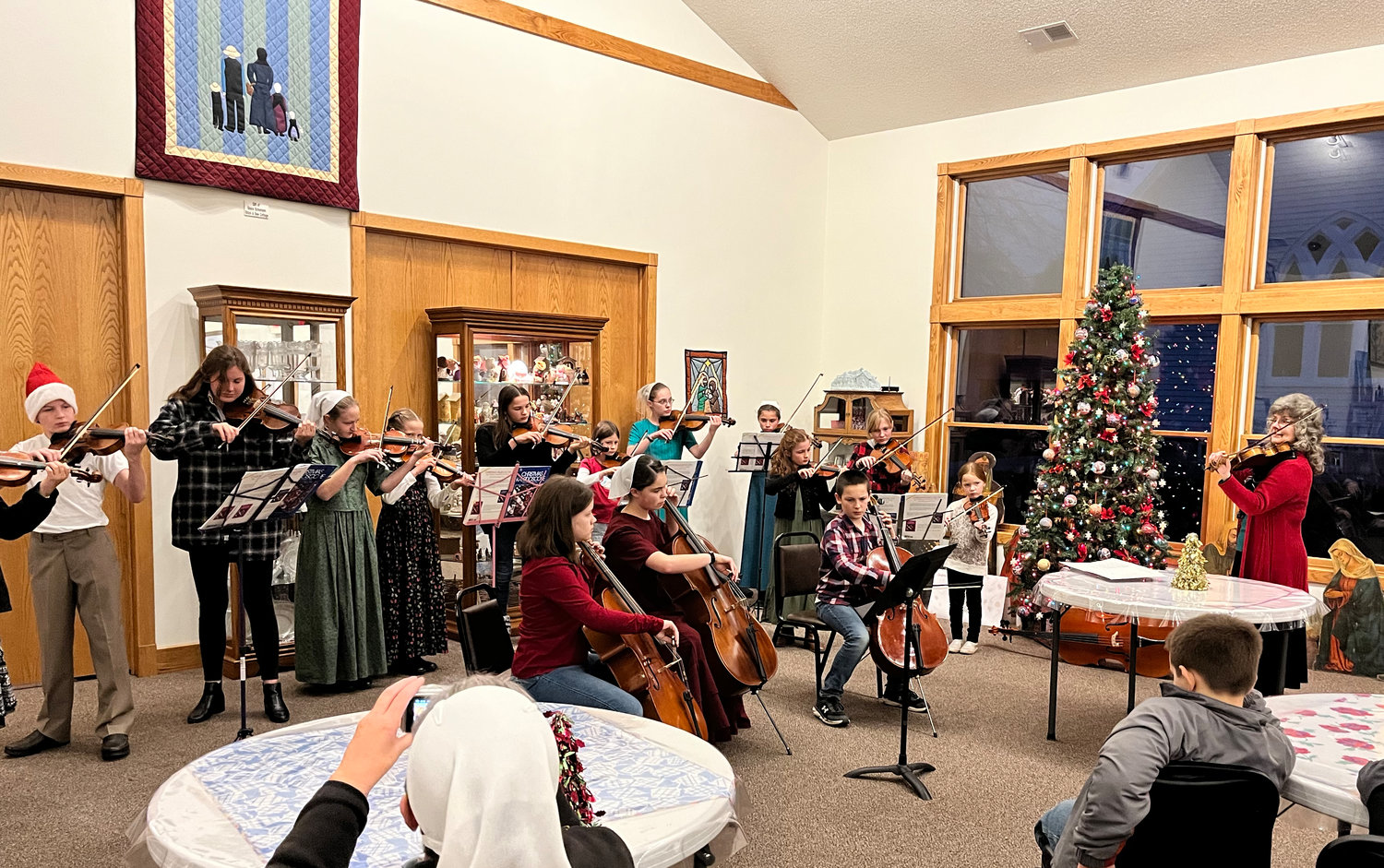 The Mid-Prairie Homeschool Strings played at the Village.