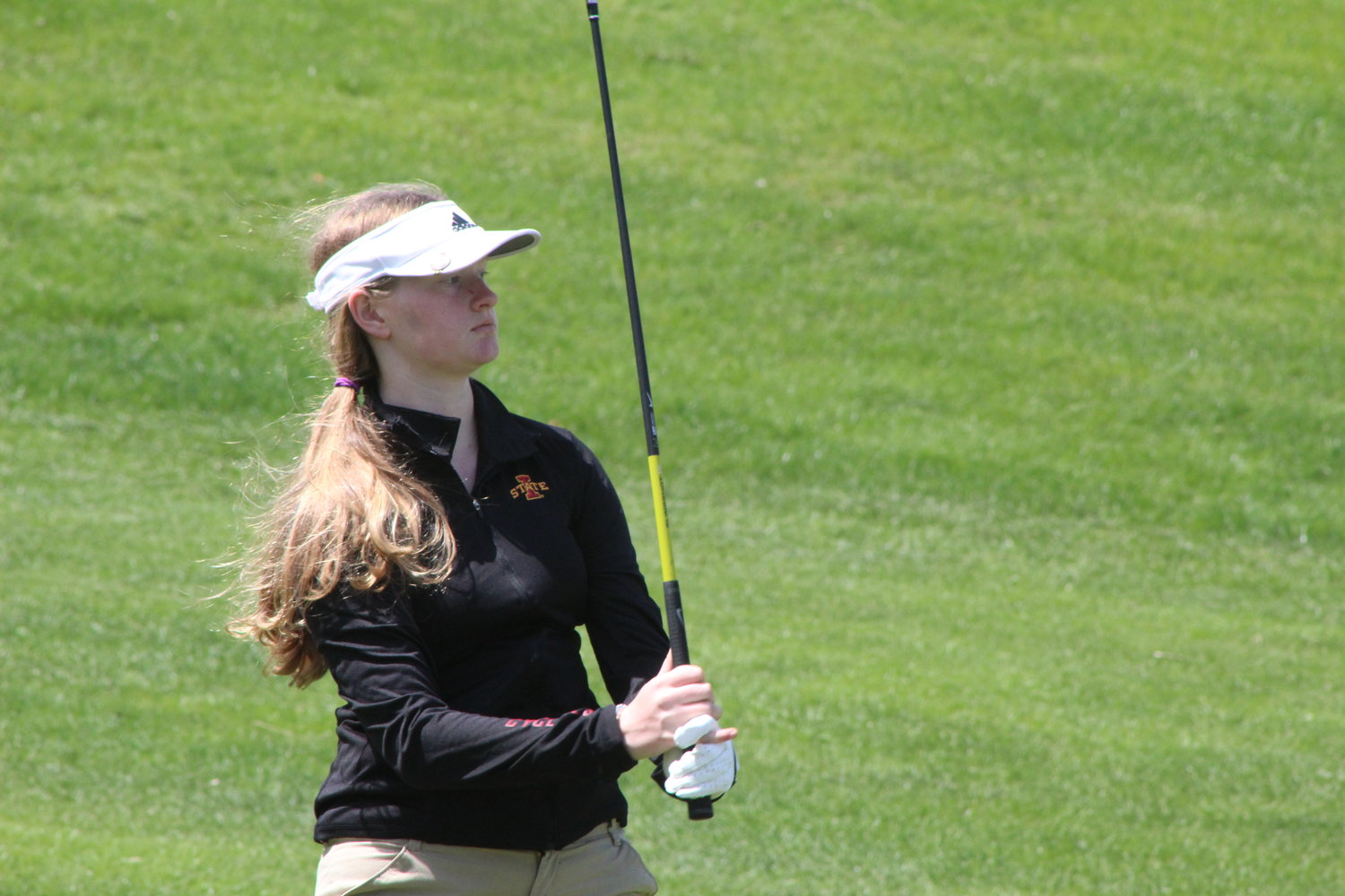 Mid-Prairie sophomore Madi Davidson watches a shot she hit in the River Valley Conference championship tournament. She finished third and was named to the RVC Elite Team.
