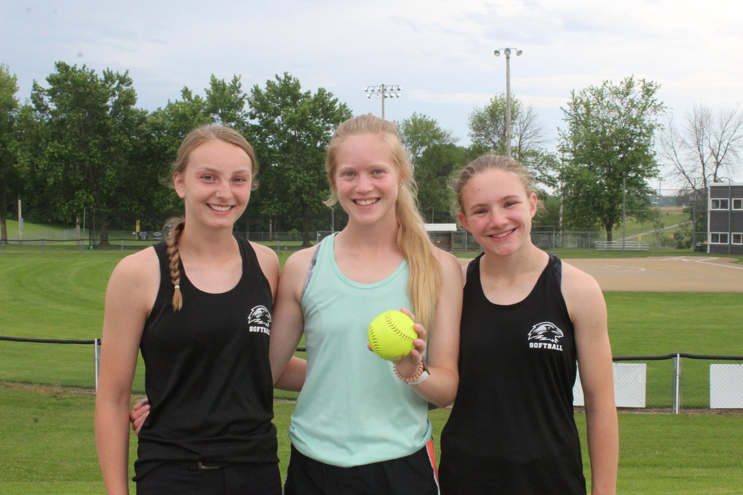 Hillcrest Academy softball players, from left, Malia Yoder, Leah Bontrager and Morgyn Nafziger.