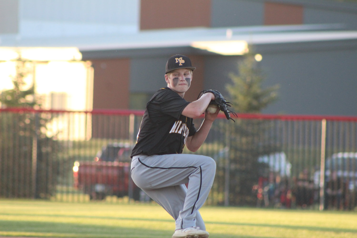 Mid-Prairie freshman Brady Weber delivers a pitch against Monticello.