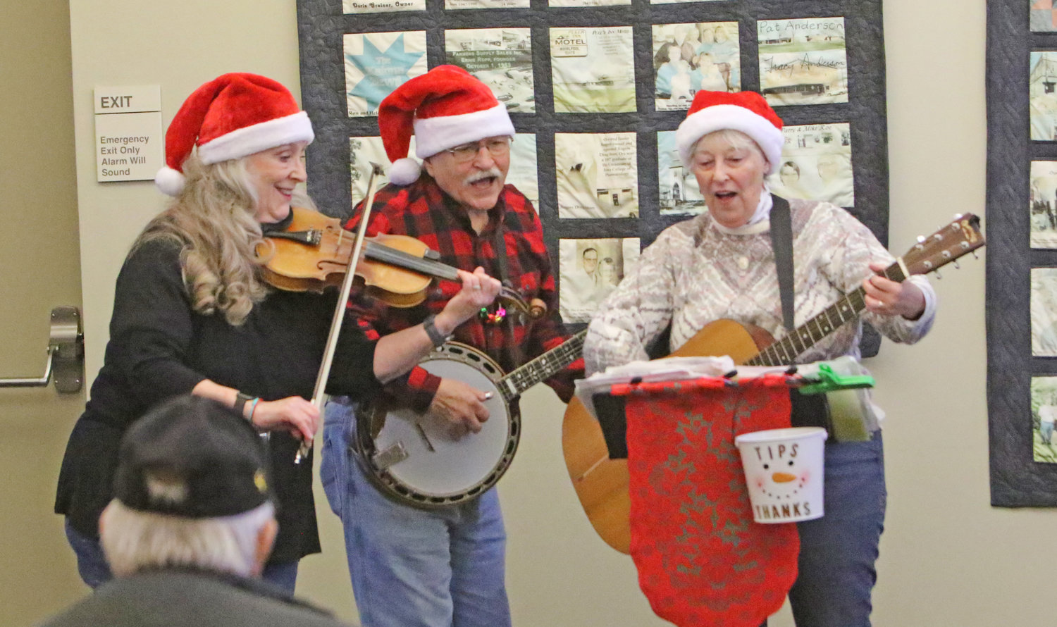 Banjoy entertained a crowd at the Kalona Public Library.