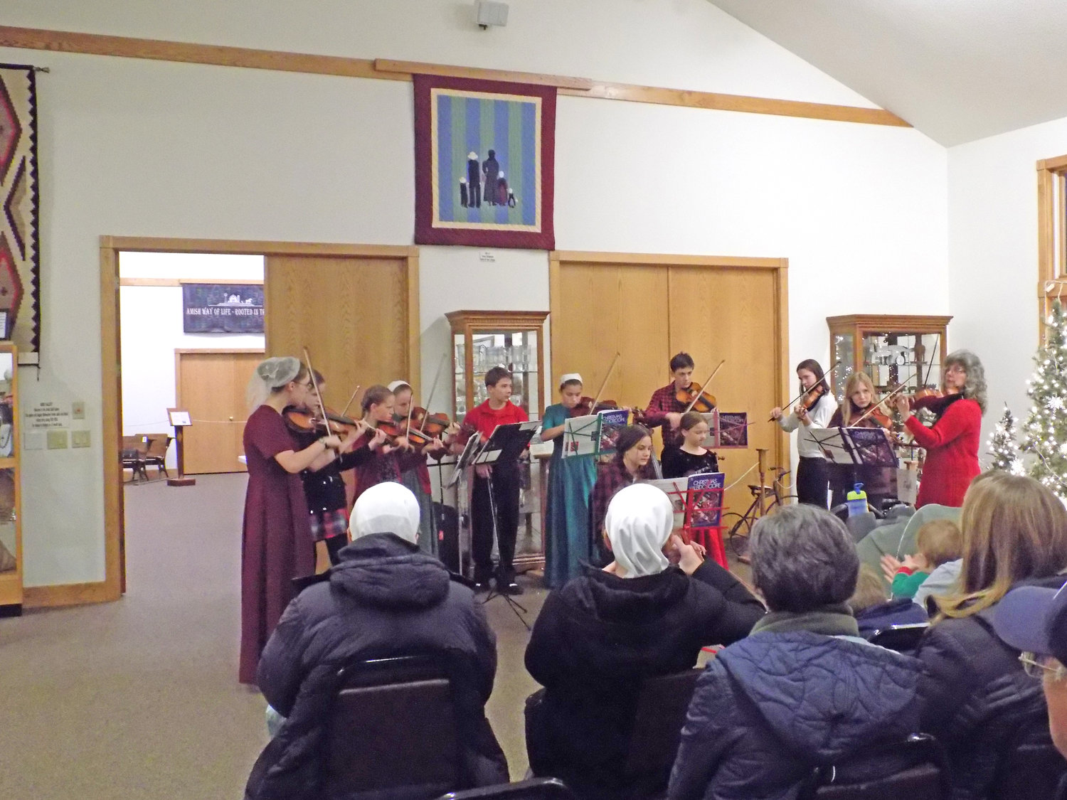 Musical performances filled the evening at Kalona Historical Village’s Welcome center on Saturday night.