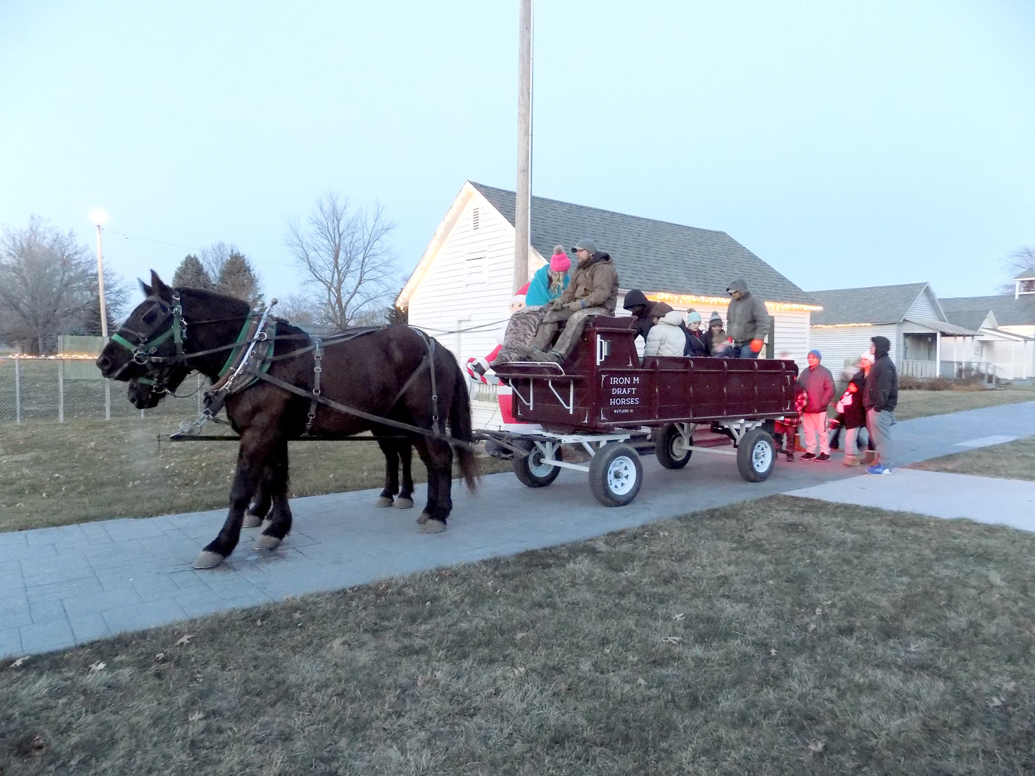 Horse-drawn carriage rides around town were a popular activity for families.