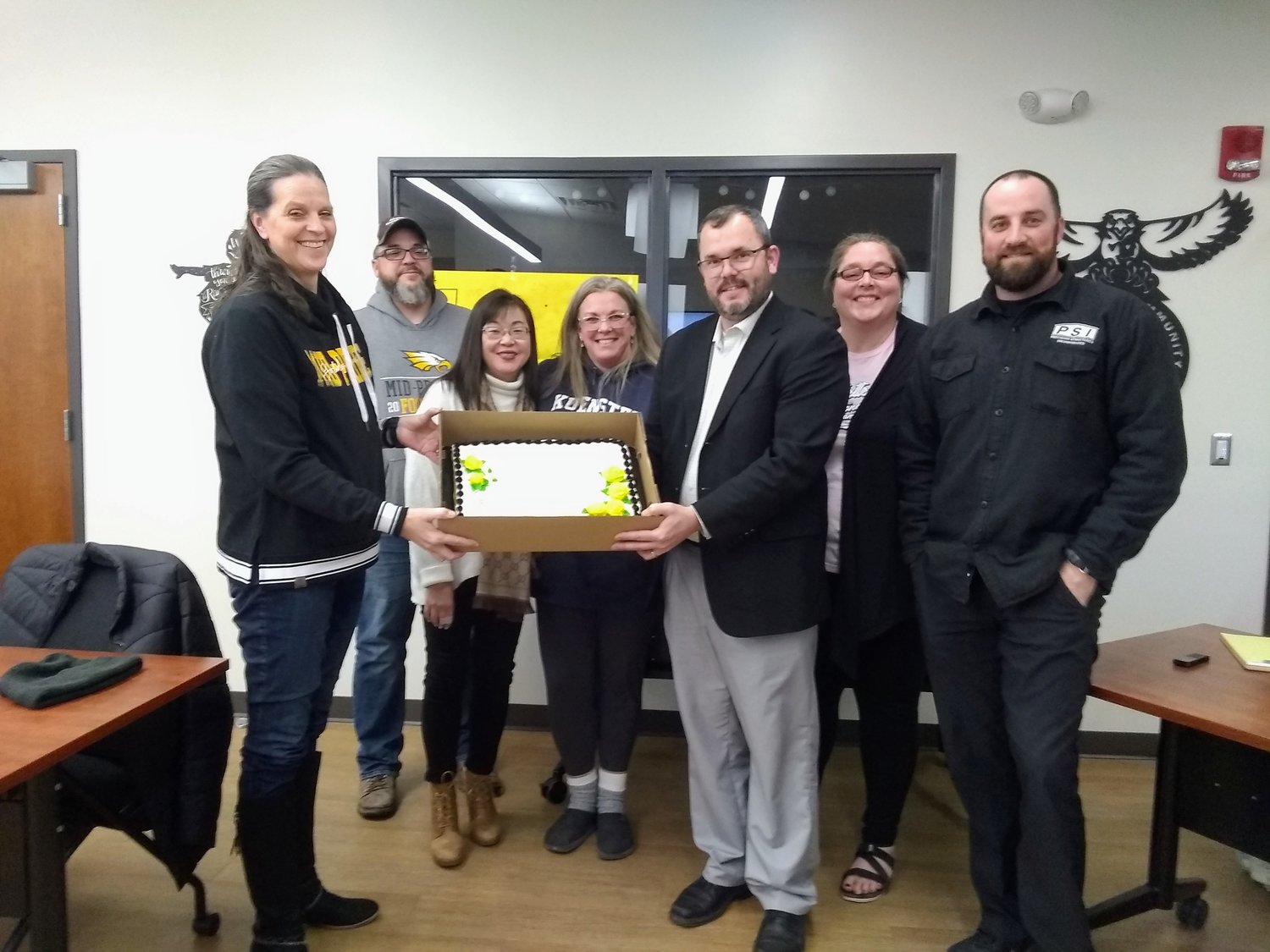 Superintendent Brian Stone presented school board members with a cake in recognition of School Board Appreciation Month at their regular meeting on Jan. 23.  L-R: Denise Chittick, Jake Snider, Marianne Schlabach, Mary Allred, Jeremy Pickard (President), Gabrielle Frederick (Vice President), and Jed Seward.