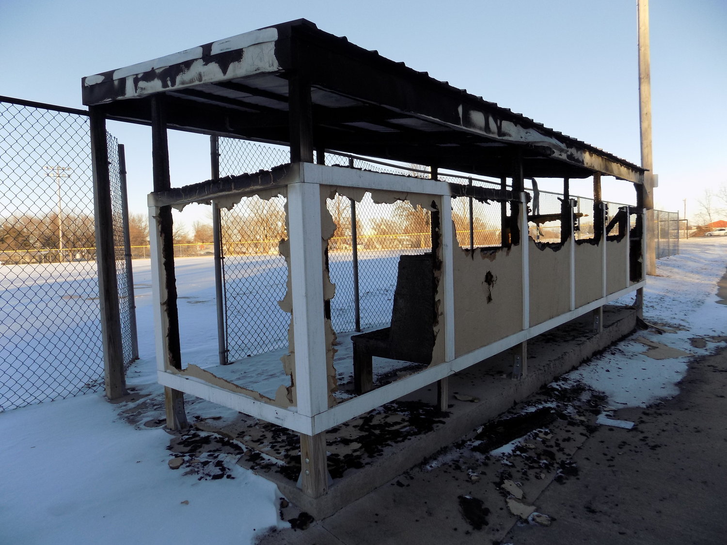The dugout in front of the concession stand at North Park’s ball diamond is now burned out, blackened char thanks to vandals.  The dugout was originally purchased with a  Washington County Riverboat Foundation grant.