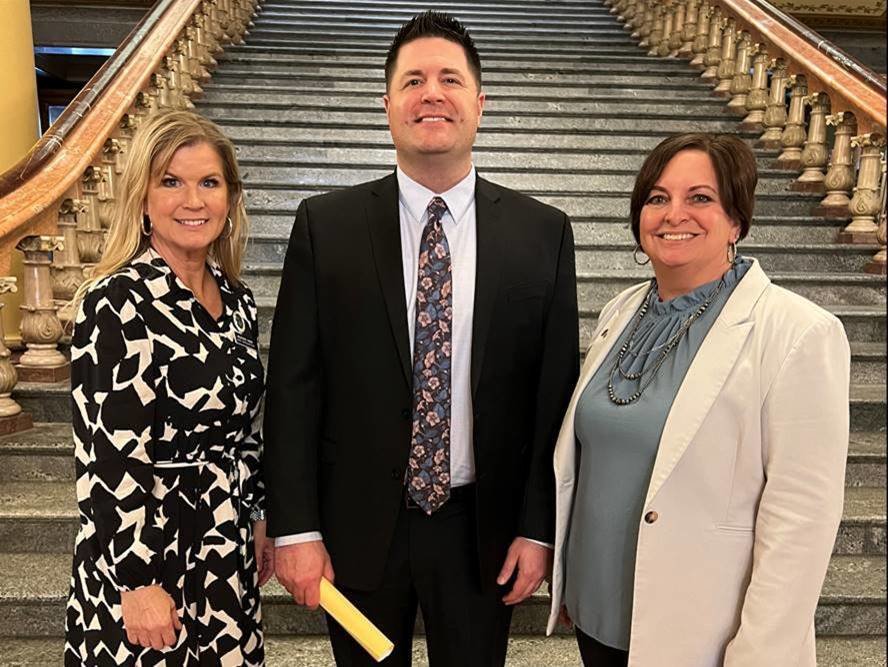 Rep. Heather Hora; General Manager of Riverside Casino, Damon John; and Sen. Dawn Driscoll at the state capitol.