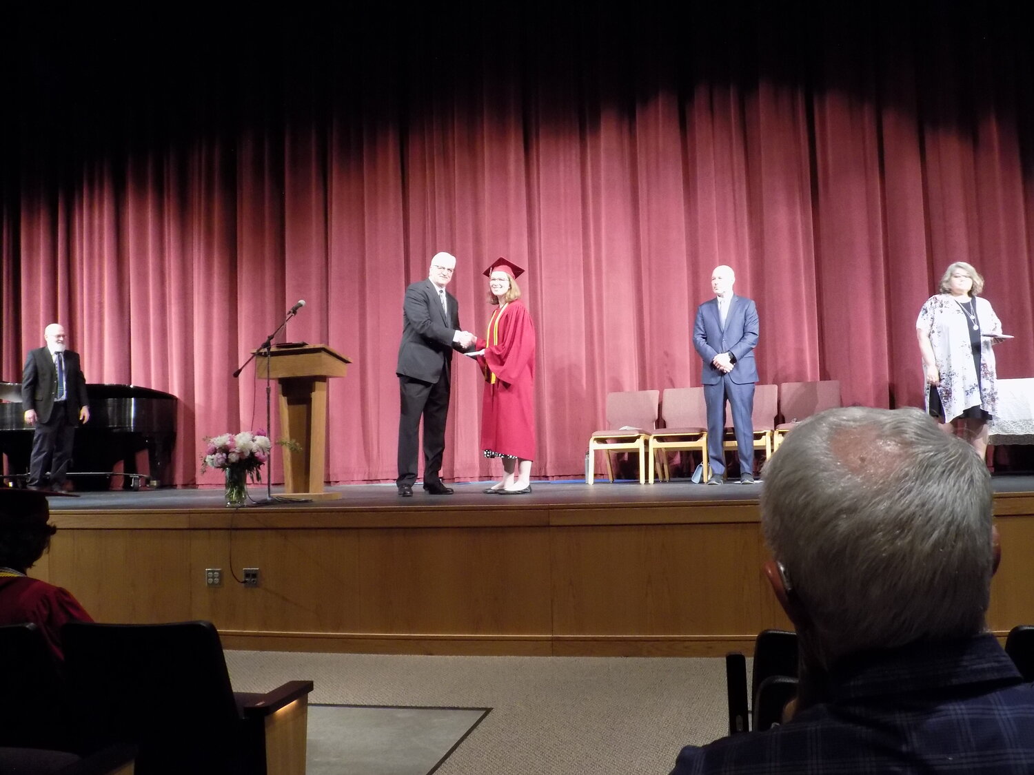 Rebecca Farrier receives her diploma.